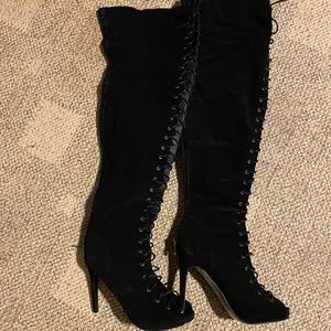 Thigh high lace up boots